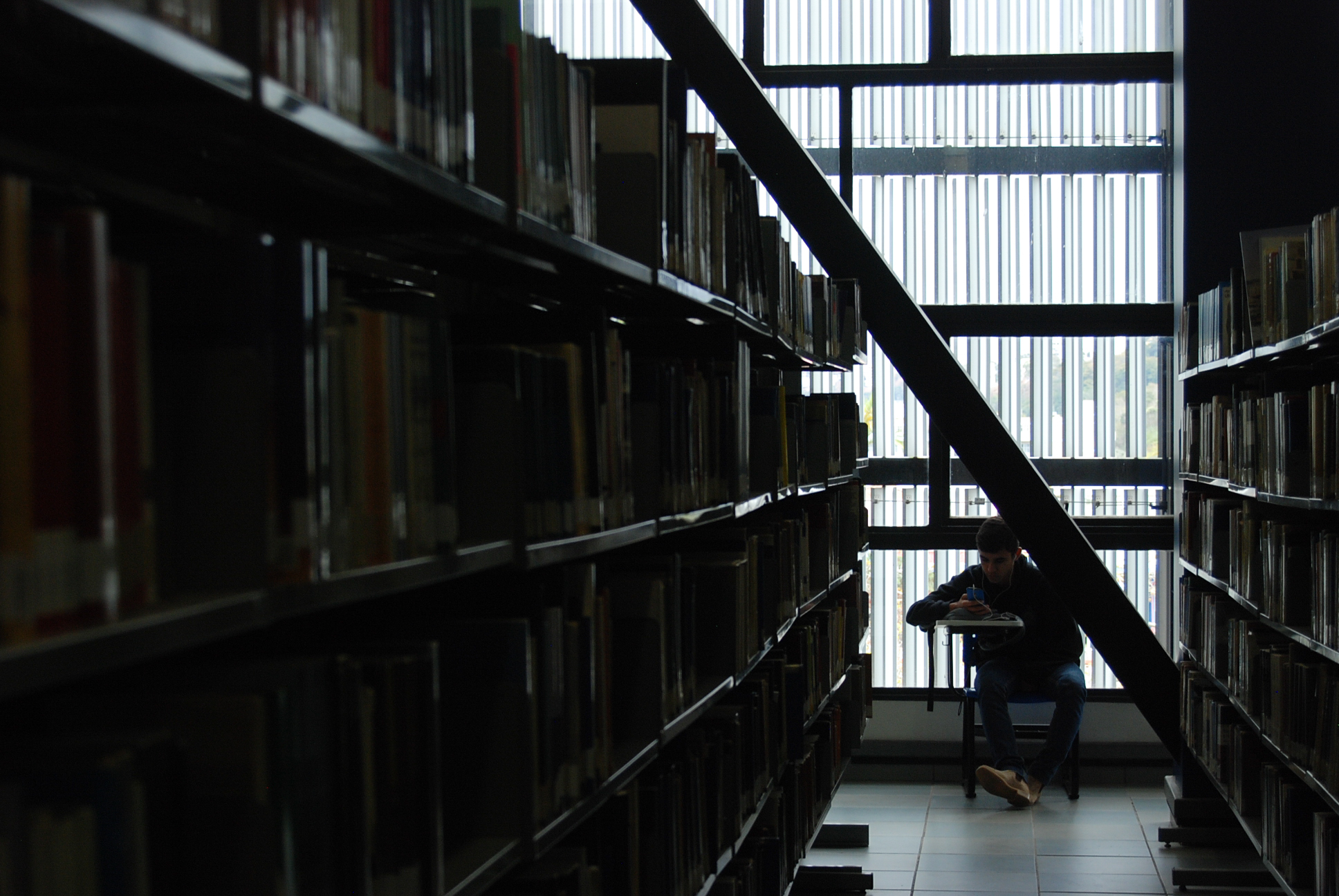 guy studying at the library